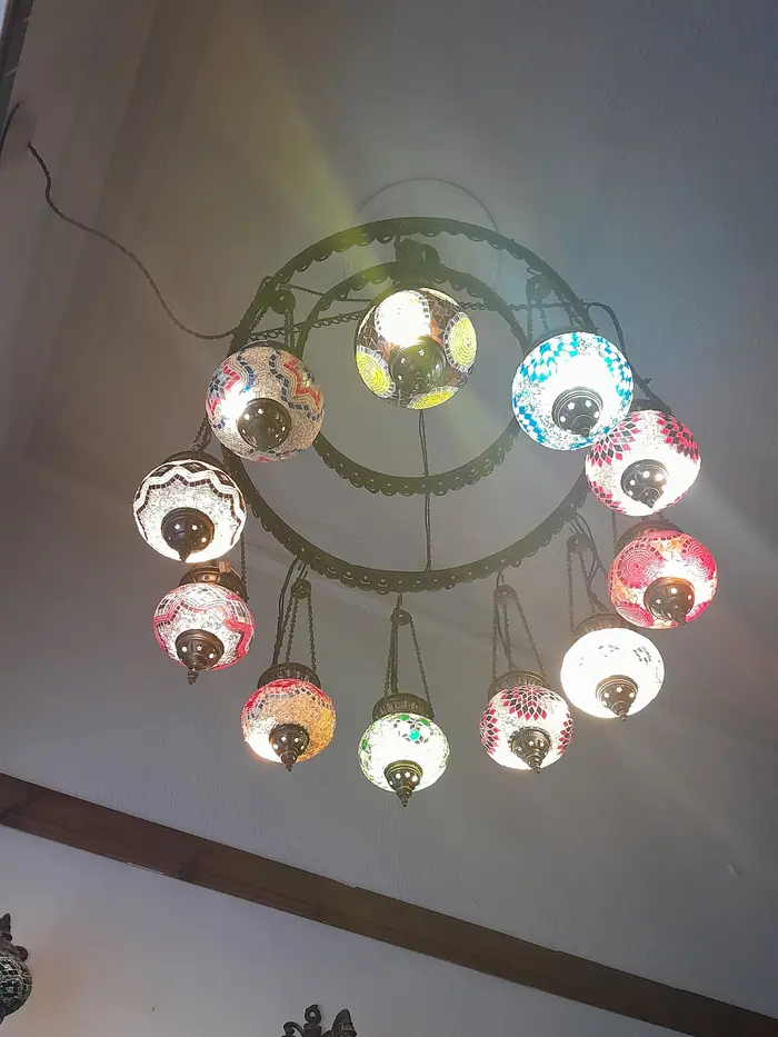 Ring chandelier of colourful mosaic glass lamps