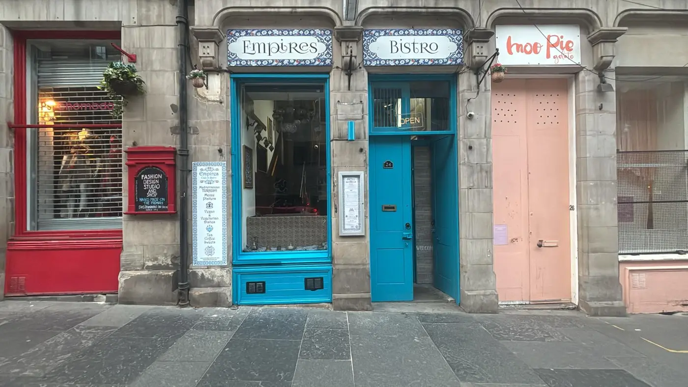 Empires Bistro's turquoise shopfront with İznik-tiled sign panels on St Mary's Street